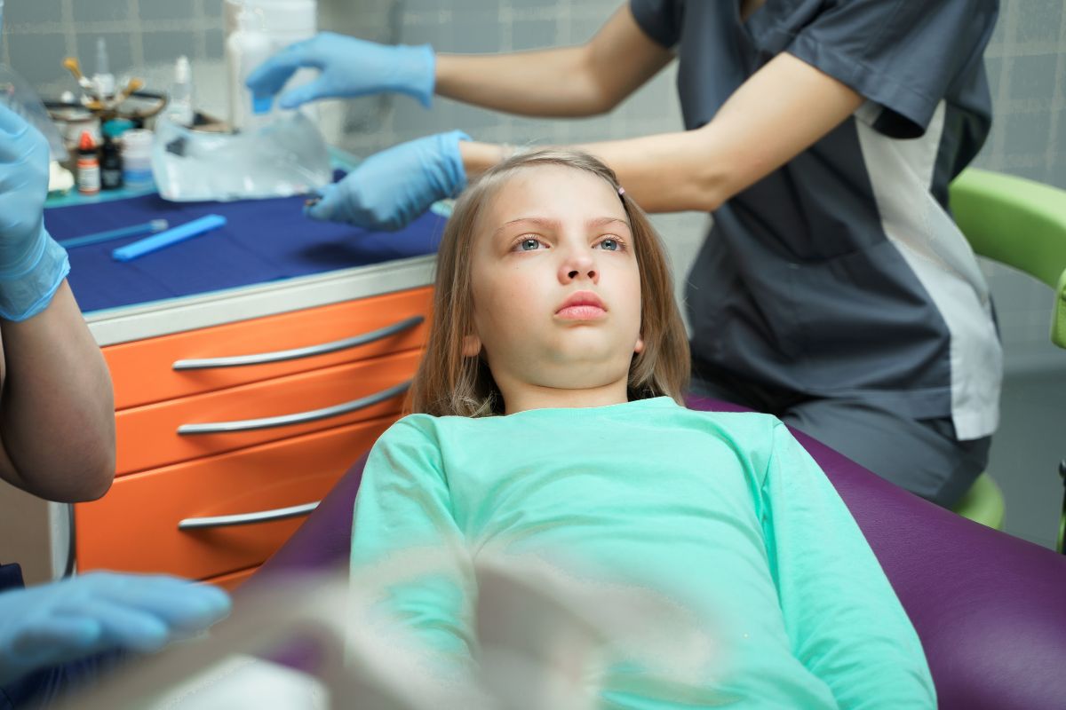 Signs your child may need a tooth extraction due to severe tooth decay or dental injury